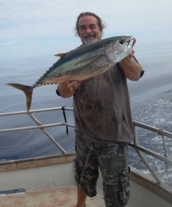 Danny with his first small yellowfin