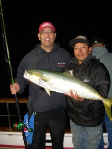 Dean Okamura, with deckhand Axel